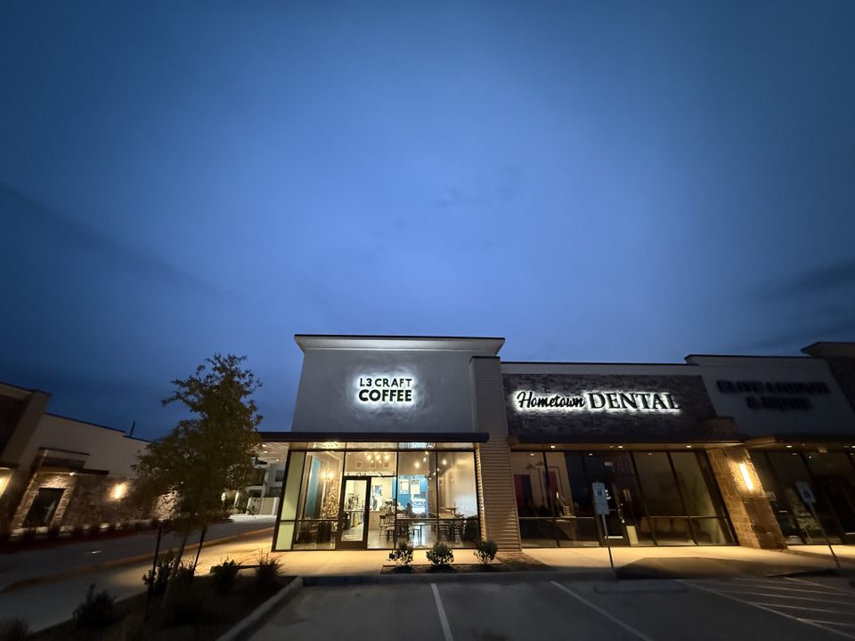 L3 Craft Coffee storefront at dusk